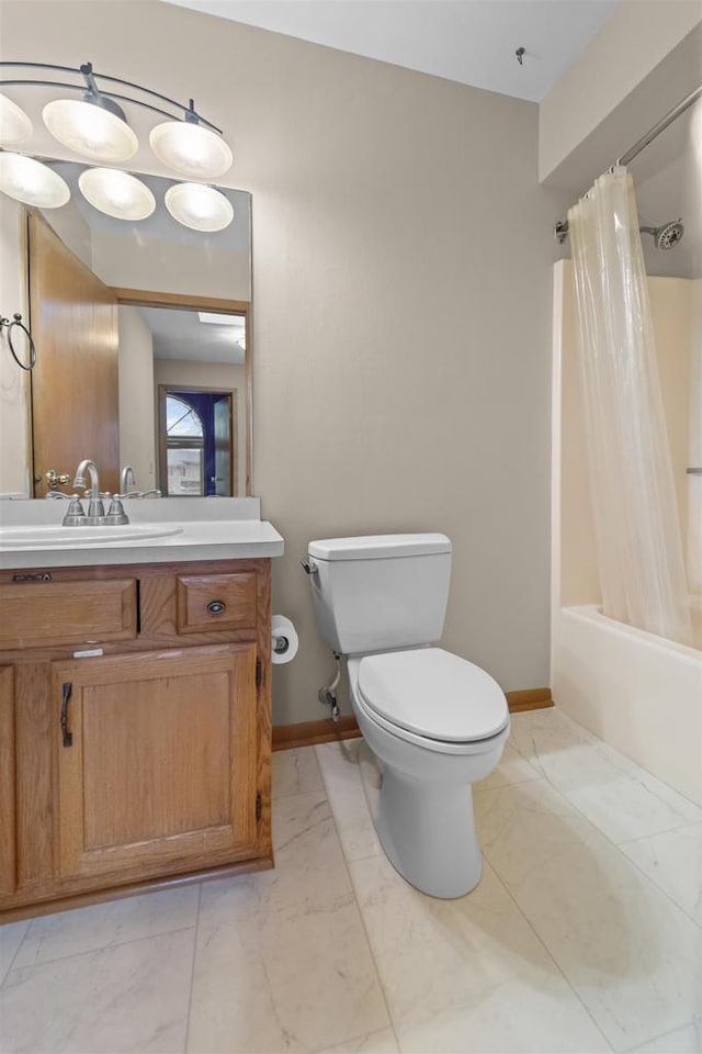 314 Castle Oaks Xing, Waunakee, WI 53597 - full bath featuring marble finish flooring, toilet, vanity, shower / bath combo with shower curtain, and baseboards