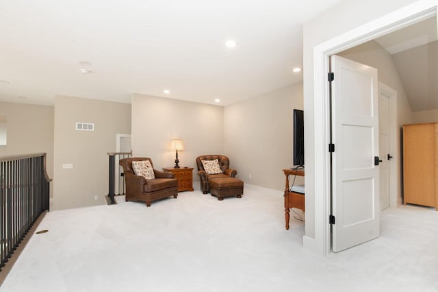 4779 Pine Meadows Ln, Hartland, WI 53029 - living area featuring recessed lighting, visible vents, an upstairs landing, and carpet