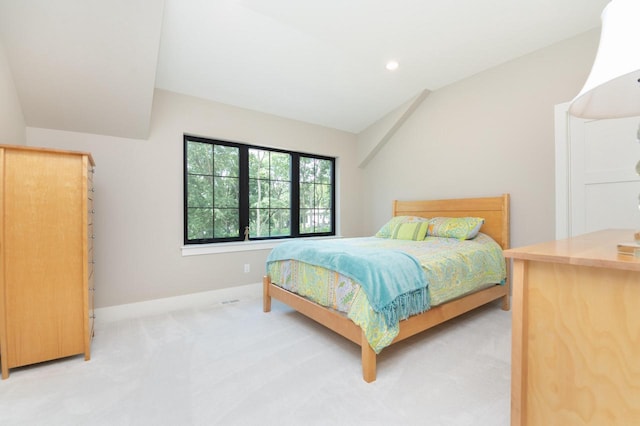 4779 Pine Meadows Ln, Hartland, WI 53029 - bedroom with lofted ceiling, recessed lighting, light colored carpet, and baseboards