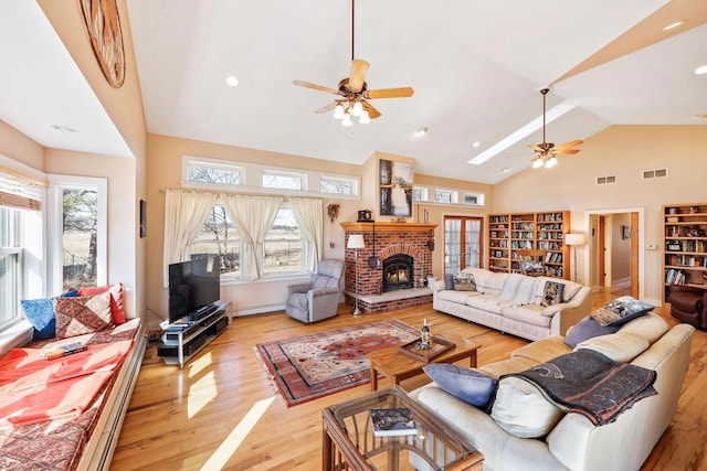 6112 County Road A, Brooklyn, WI 53521 - living room featuring light wood-style flooring, visible vents, and ceiling fan