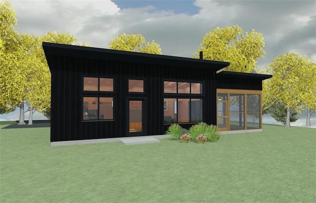 LOT45 Atlas Ln, Hayward, WI 54843 - rear view of house featuring a lawn, board and batten siding, and a sunroom
