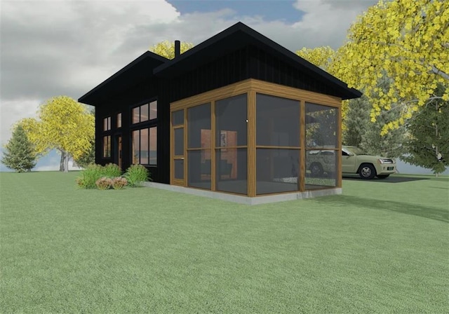 LOT45 Atlas Ln, Hayward, WI 54843 - rear view of property featuring a sunroom and a yard