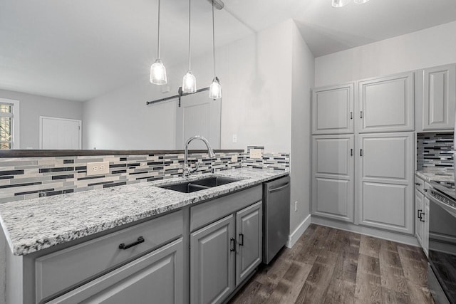 kitchen with gray cabinets, electric stove, a sink, a barn door, and dishwasher