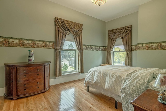 1222 11th St, Monroe, WI 53566 - bedroom featuring wood finished floors