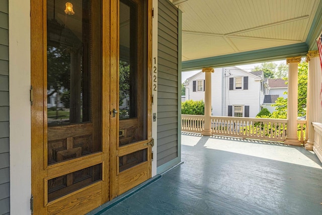 1222 11th St, Monroe, WI 53566 - doorway to property featuring a porch