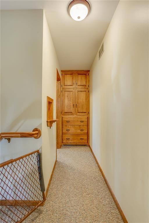 1353 Van Buren St, Black River Falls, WI 54615 - hallway with visible vents, baseboards, and light colored carpet