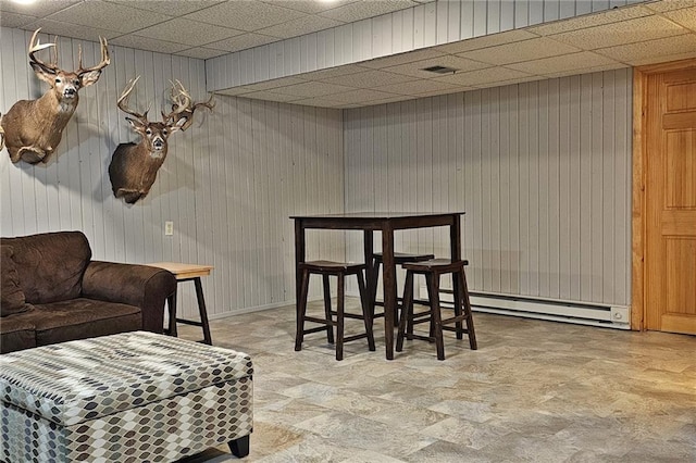 1353 Van Buren St, Black River Falls, WI 54615 - dining area featuring baseboard heating and a drop ceiling