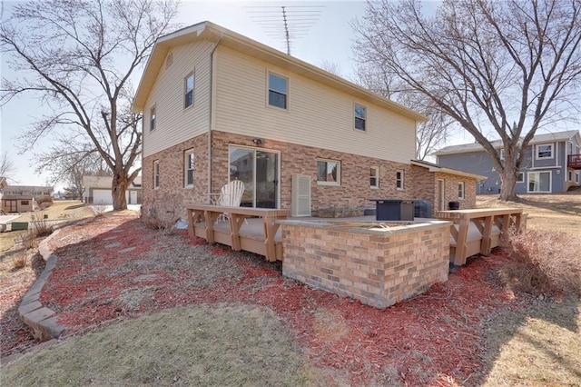 1353 Van Buren St, Black River Falls, WI 54615 - back of house with brick siding