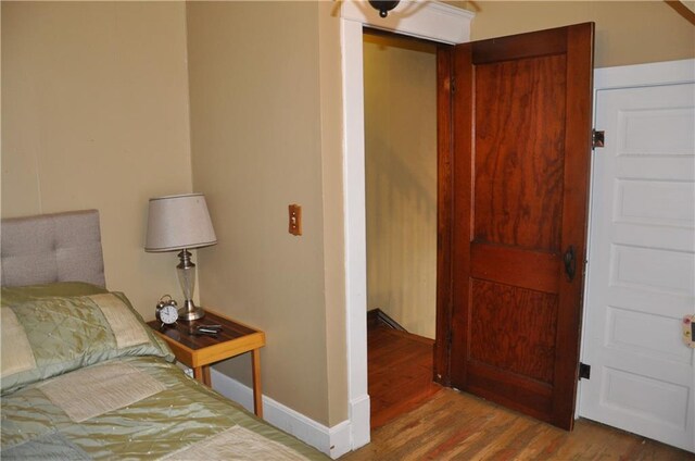13600 8th St, Osseo, WI 54758 - bedroom featuring wood finished floors and baseboards