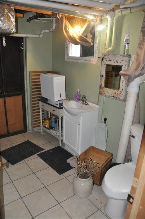 13600 8th St, Osseo, WI 54758 - bathroom featuring tile patterned floors, toilet, and vanity