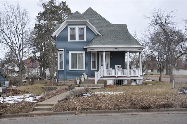 13600 8th St, Osseo, WI 54758 - victorian house featuring roof with shingles and a porch