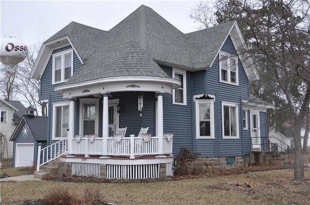 13600 8th St, Osseo, WI 54758 - view of front of home featuring a porch and roof with shingles