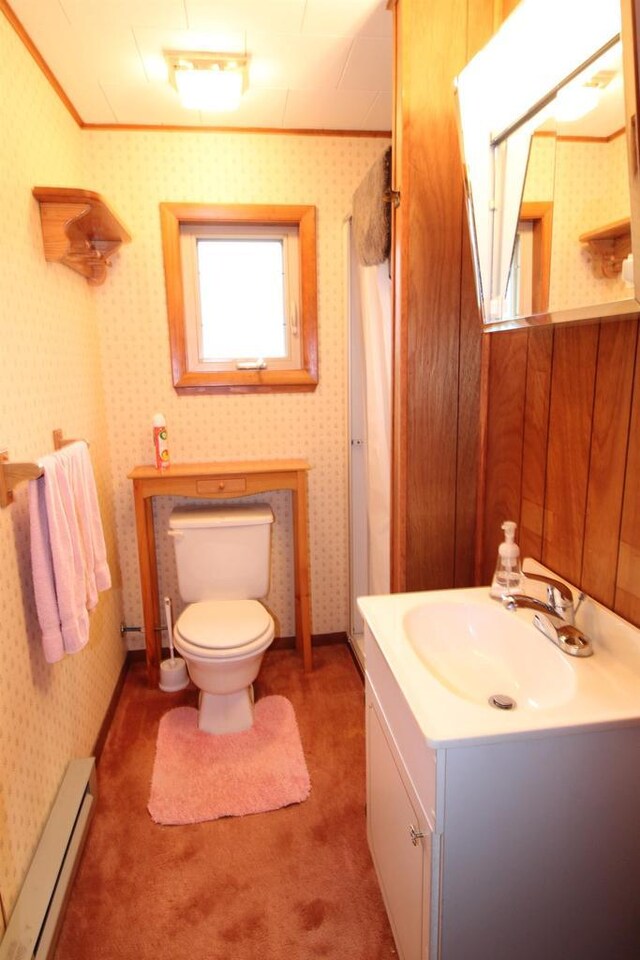 1984 W 7th Dr, Friendship, WI 53934 - full bathroom featuring crown molding, wallpapered walls, and a baseboard heating unit