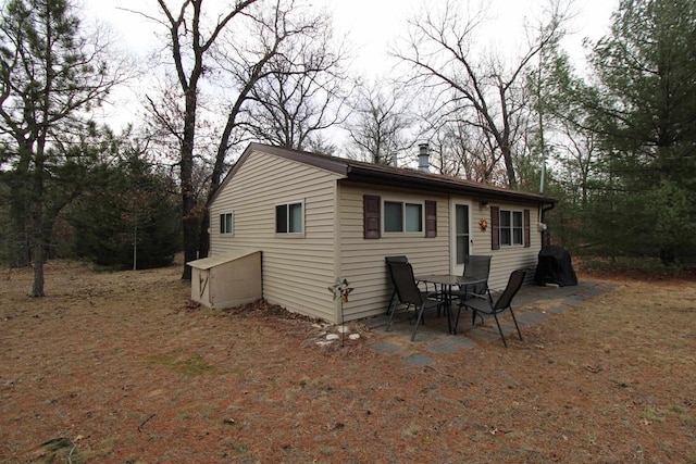 1984 W 7th Dr, Friendship, WI 53934 - view of front of home with a patio and a chimney