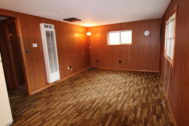 1984 W 7th Dr, Friendship, WI 53934 - unfurnished room with a heating unit, baseboards, and wood finished floors