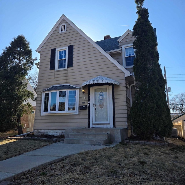 3731 S 56th St, Greenfield, WI 53220 - view of front facade with a chimney