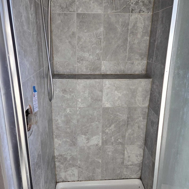 3731 S 56th St, Greenfield, WI 53220 - interior details featuring a tile shower