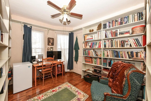 office area featuring wood finished floors and ceiling fan