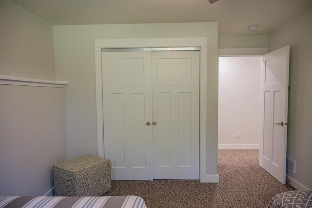 N9310 22nd Ave, Necedah, WI 54646 - unfurnished bedroom featuring a closet, visible vents, baseboards, and carpet floors
