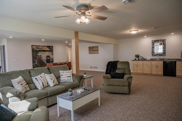 N9310 22nd Ave, Necedah, WI 54646 - living room featuring visible vents, wet bar, light colored carpet, and a textured ceiling