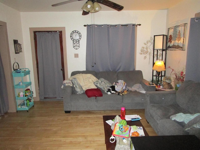454 Center St, Adams, WI 53910 - living area featuring wood finished floors and a ceiling fan
