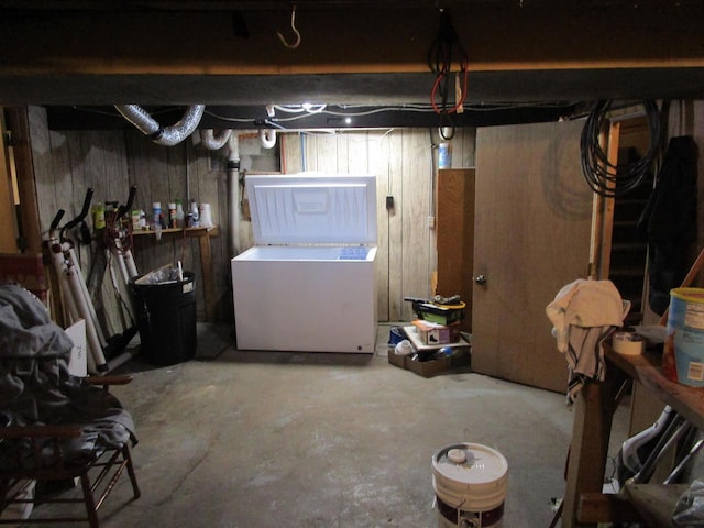 454 Center St, Adams, WI 53910 - unfinished basement featuring washer / dryer and wooden walls