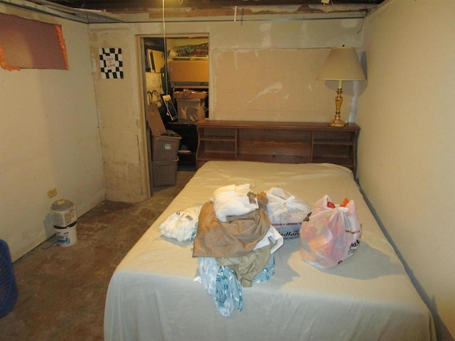 454 Center St, Adams, WI 53910 - bedroom with unfinished concrete floors and a closet