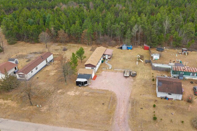 5830 Broadway St, Wisconsin Rapids, WI 54494 - birds eye view of property featuring a forest view