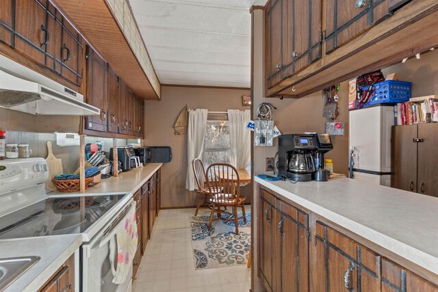 5830 Broadway St, Wisconsin Rapids, WI 54494 - kitchen with light countertops, light floors, and white electric stove