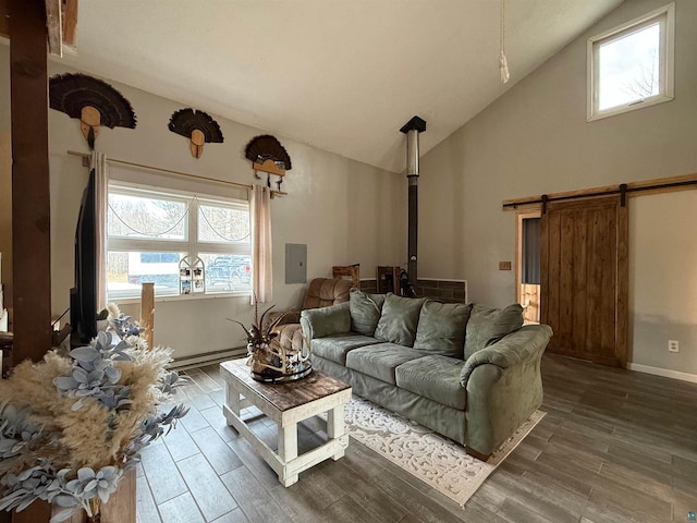 6955 Kolling Rd, Iron River, WI 54847 - living area featuring electric panel, high vaulted ceiling, baseboards, and wood finished floors