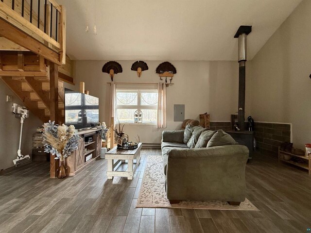 6955 Kolling Rd, Iron River, WI 54847 - living area with electric panel and wood finished floors