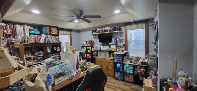 1116 Washington Ave, Stevens Point, WI 54481 - home office with a tray ceiling, ceiling fan, wood finished floors, and recessed lighting
