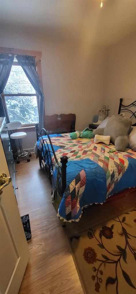 1116 Washington Ave, Stevens Point, WI 54481 - bedroom featuring light wood finished floors
