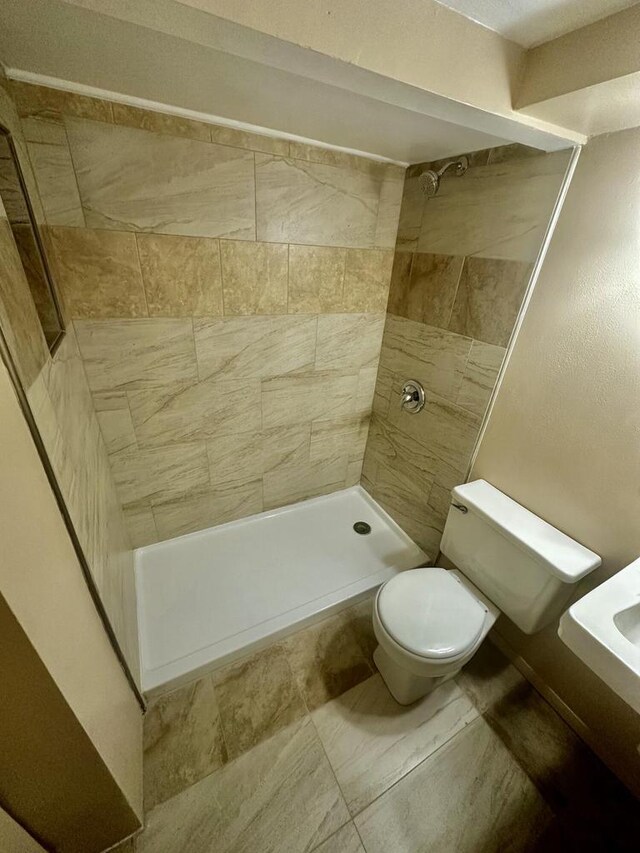 7140 N 48th St, Milwaukee, WI 53223 - bathroom with toilet and a tile shower