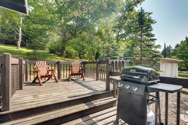 wooden terrace with grilling area