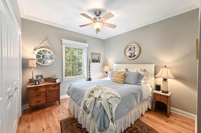 N8512 Booth Lake Heights Rd, East Troy, WI 53120 - bedroom with light wood-style flooring, crown molding, and baseboards