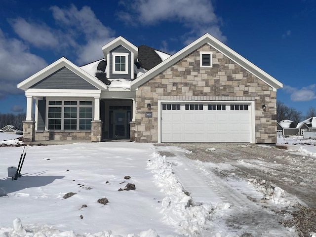 3371 Capellla Ln, Green Bay, WI 54311 - view of front of house featuring stone siding and a garage
