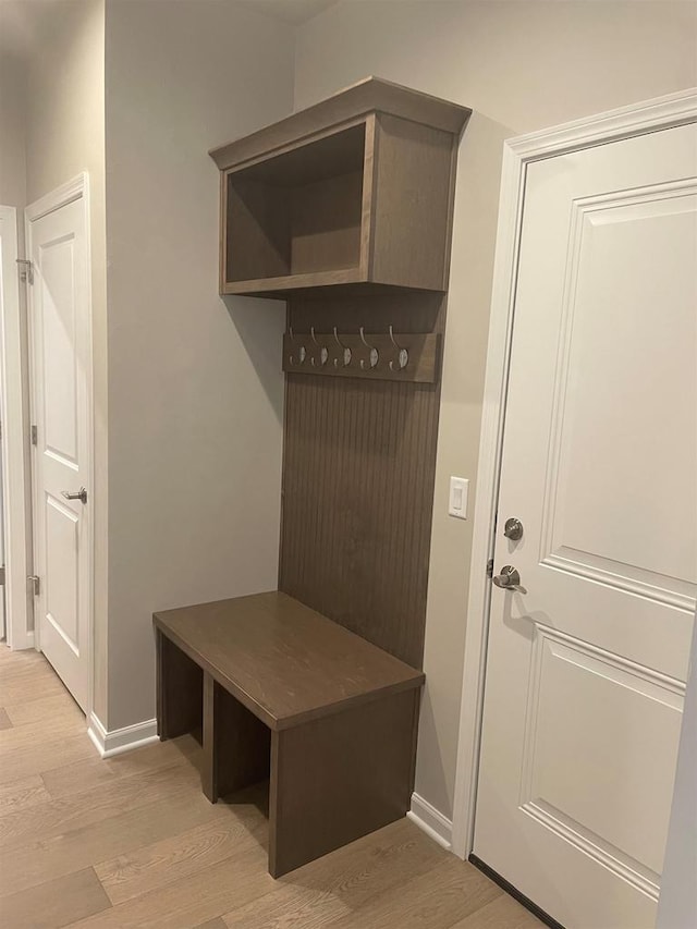 3371 Capellla Ln, Green Bay, WI 54311 - mudroom featuring baseboards and light wood-style floors