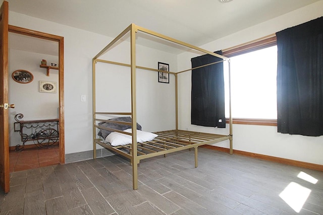 207 E Water St, Montello, WI 53949 - bedroom with wood finished floors and baseboards
