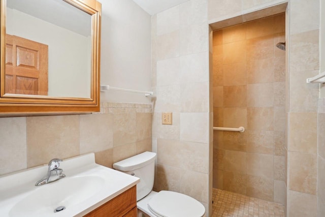 1301 Wyldhaven Ave, Monona, WI 53716 - full bathroom featuring tile walls, toilet, tiled shower, and vanity