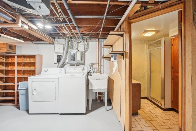 1301 Wyldhaven Ave, Monona, WI 53716 - clothes washing area featuring laundry area, washing machine and clothes dryer, and electric panel