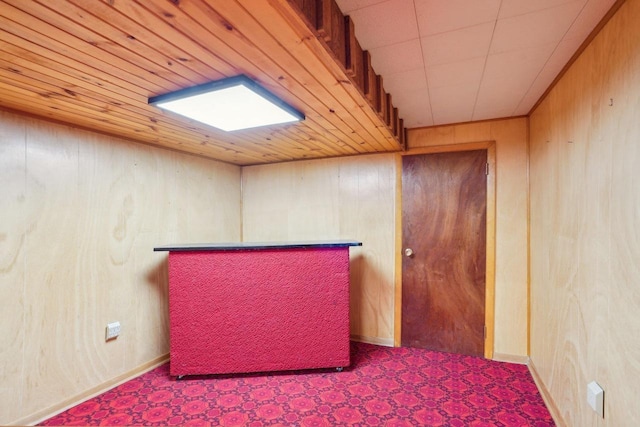 1301 Wyldhaven Ave, Monona, WI 53716 - interior space featuring tile patterned floors, a dry bar, wooden walls, and wood ceiling