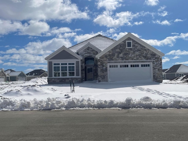 3390 Evening Star Dr, Green Bay, WI 54311 - view of front facade with stone siding and a garage