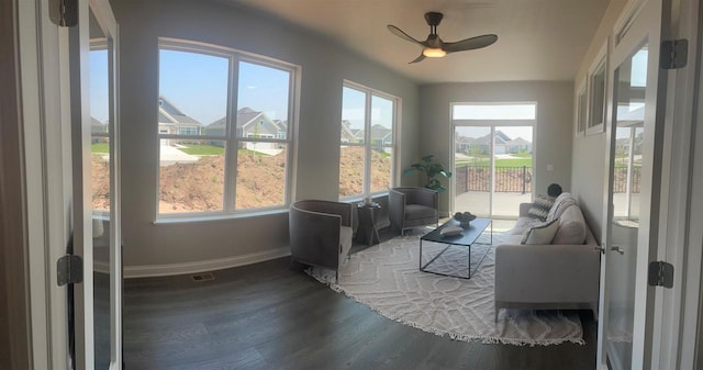 3390 Evening Star Dr, Green Bay, WI 54311 - sunroom with wood finished floors and baseboards