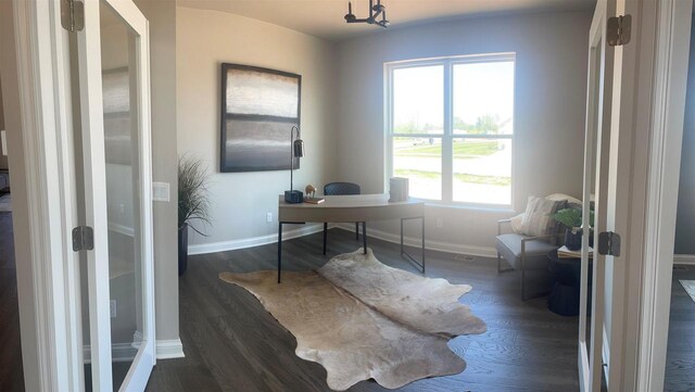 3390 Evening Star Dr, Green Bay, WI 54311 - office area featuring baseboards and dark wood-style floors