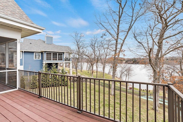 E12275 Timber Ridge Trl, Prairie Du Sac, WI 53578 - deck featuring a water view, a sunroom, and a lawn