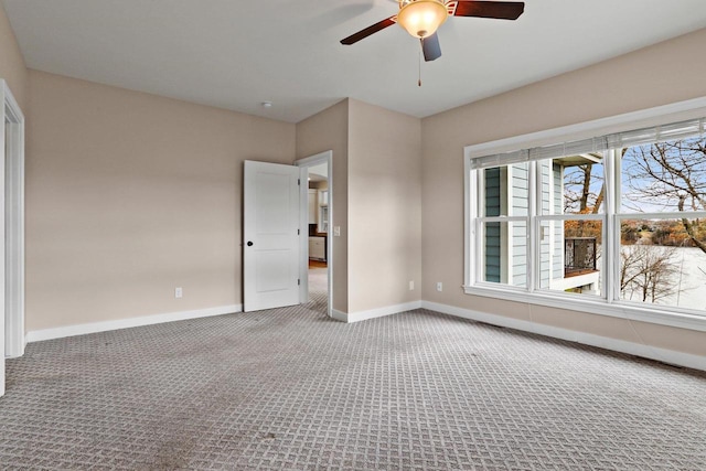 E12275 Timber Ridge Trl, Prairie Du Sac, WI 53578 - carpeted spare room featuring baseboards and a ceiling fan