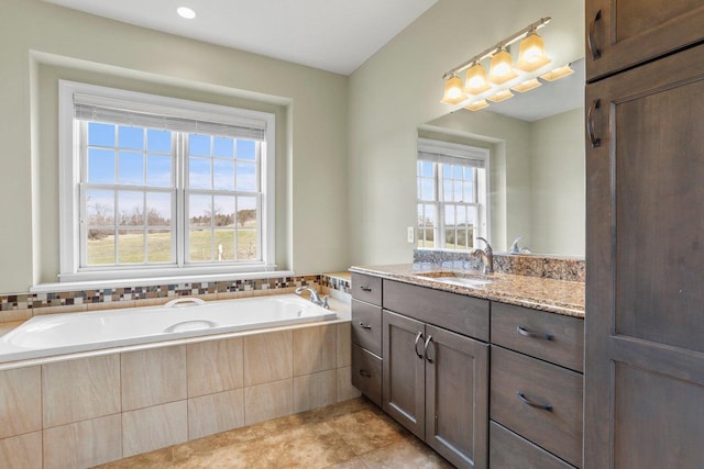 E12275 Timber Ridge Trl, Prairie Du Sac, WI 53578 - full bathroom featuring a garden tub, tile patterned flooring, and vanity