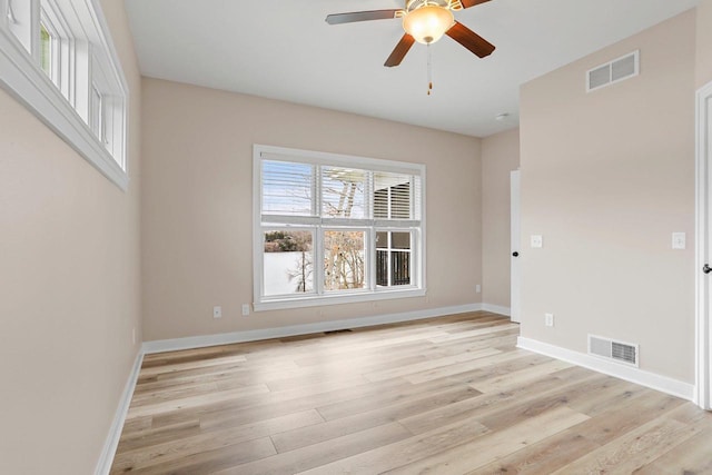 E12275 Timber Ridge Trl, Prairie Du Sac, WI 53578 - spare room featuring baseboards, light wood-style flooring, and visible vents