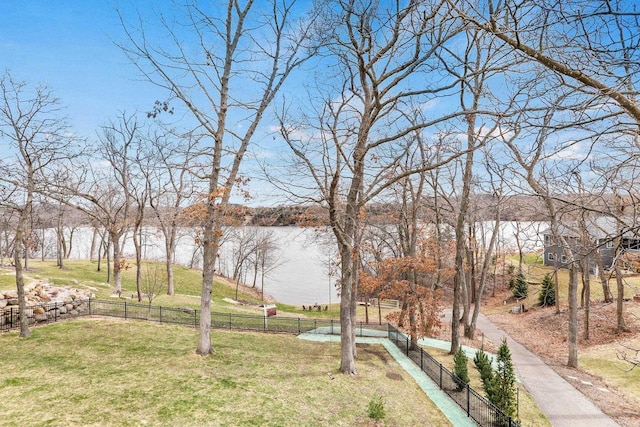 E12275 Timber Ridge Trl, Prairie Du Sac, WI 53578 - view of home's community featuring a lawn, a water view, and fence